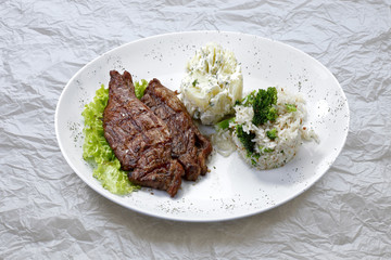 Grilled meat with trimmings