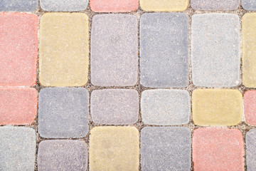 Fototapeta premium Background, texture of urban multicolored pavers on the whole frame. Horizontal frame