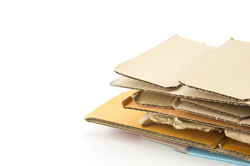 Big stack of cardboard isolated on white background - recycle concept.