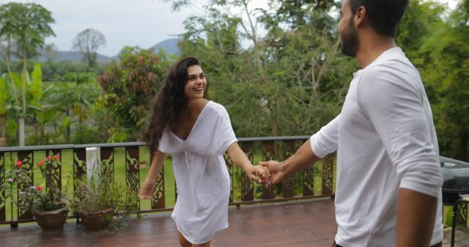 Couple Walking Terrace, Cheerful Woman Holding Man Hand Happy Smiling Enjoy Morning View Of Tropic Forest Slow Motion 60