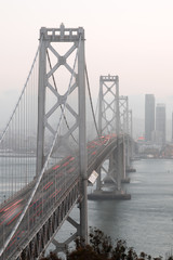San Francisco's Bay Bridge Close-up on a Foggy Evening. Yerba Buena Island, San Francisco, California, USA.