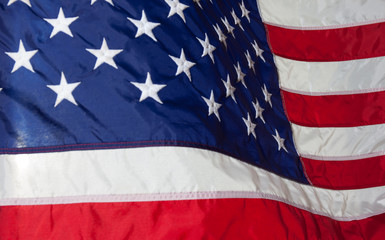 USA flag. American flag. American flag blowing wind.
