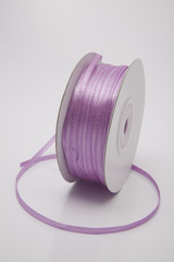 Pink-mauve color ribbon roll