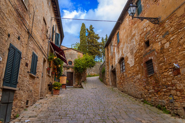  View of a street of the small and famous town of Volterra, Italy.