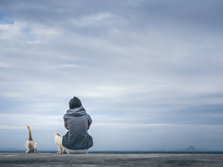 woman sitting on the roof