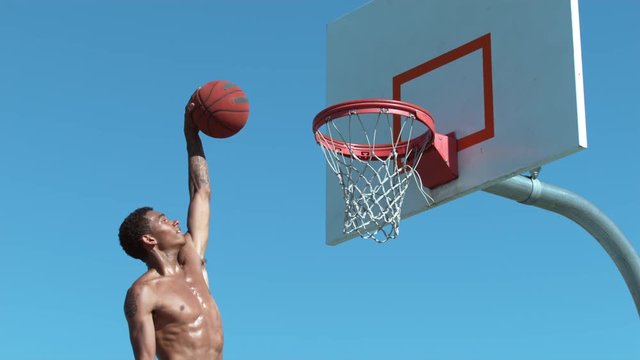 Super slow motion shot of basketball basketball slam dunk, shot on Phantom Flex 