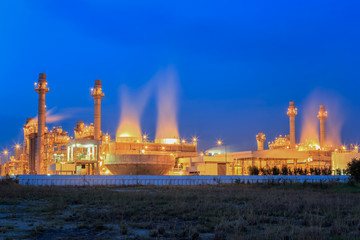 Fototapeta na wymiar Gas turbine electrical power plant at dusk with twilight support all factory in industrial Estate 