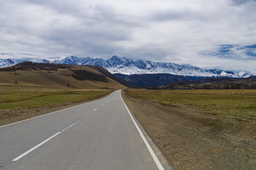 Road in snowy mountains