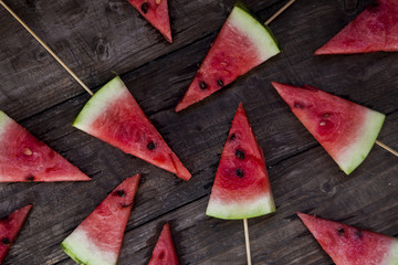 watermelon on a dark wooden background