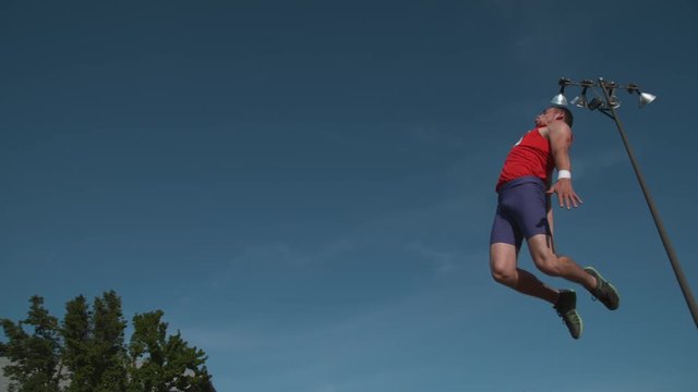 Track athlete doing long jump in super slow motion, shot on Phantom Flex 