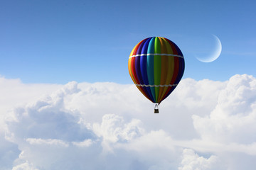 Aerostat flying above clouds