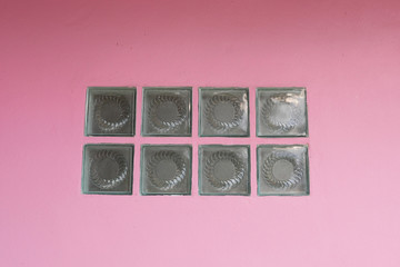 Glass blocks at the pink wall	