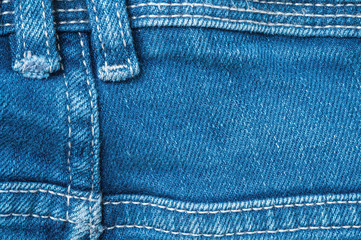 Closeup surface back side of old blue jean trousers fabric textured background