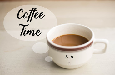 Coffee Time coffee words on cup of coffee on the table.