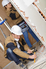 Renovation team working on property