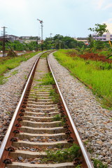 Fototapeta na wymiar railway track length on gravel for train transportation: Select focus with shallow depth of field :