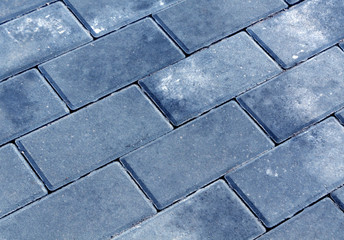 Blue color cobblestone pavement texture.