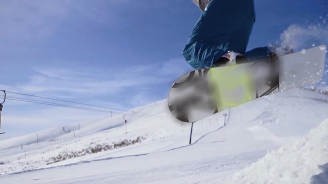Snowboarding jumping on a kicker