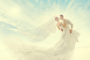 Bride and Groom Couple Dancing, Wedding Dress and Long Veil