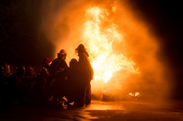 firefighters in teamwork operation