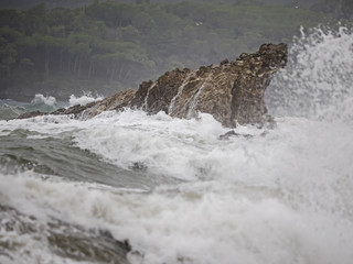 Big waves around the rock