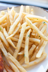Golden crisp french fries fresh out of the fryer