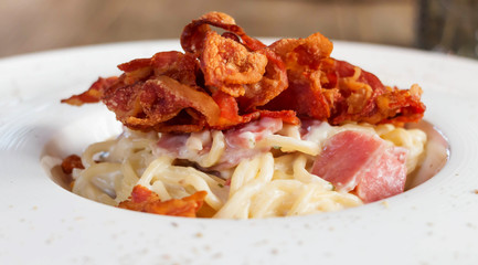 closeup carbonara in white plate
