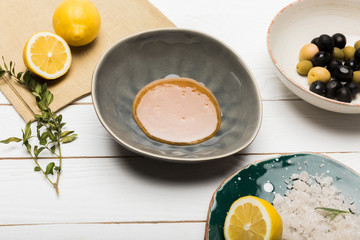 Close-up view of ingredients for homemade cosmetics on wooden table top