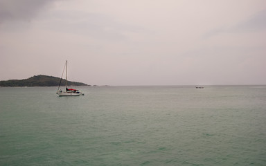 Fototapeta premium View of bay with the ships on a cloudy day.