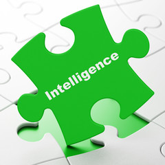 Learning concept: Intelligence on puzzle background