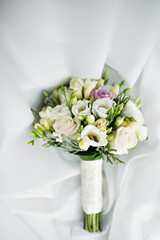 luxury Wedding bouquet. The concept of marriage and love. accessories for just married ceremony close-up. Fresh flowers