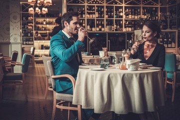 Stylish couple in a restaurant