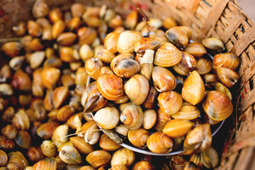 Selling fresh seafood seashells on the markets of different cities of Goa India.January 2017