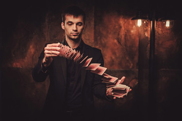 Man showing tricks with cards