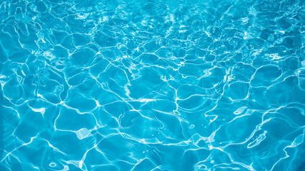 Blue water surface and ripple wave in pool