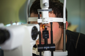 The ophthalmologist conducts the research with the help of various equipment, a contactless tonometer, for the diagnosis of eye disease