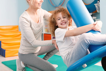 Child on pediatric swing