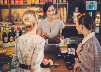 Young ladies shopping in a bakery