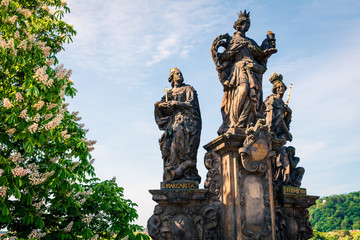 Obraz premium Sculpture of St.Margarita and St. Elisabeth on the Charles Bridge in Prague