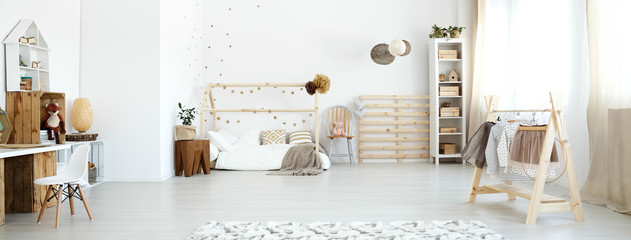 Baby room with wooden accessories