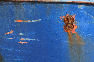 retro style rusty streaked blue metal background