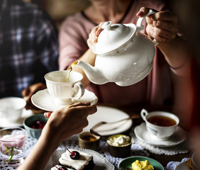 Friends Gathering Together on Tea Party Eating Cakes Enjoyment happiness - Powered by Adobe