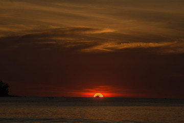 Fototapeta na wymiar Sunset with yacht against the Sun