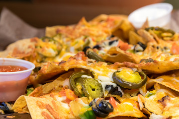 Large nacho plate smothered with cheese and jalapeno peppers. Served with salsa and sour cream.