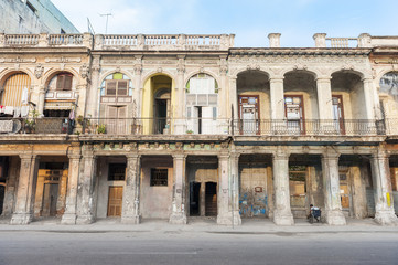 Fototapeta na wymiar Scenic view of the crumbling colonial architecture that lines the seafront Malecon street in Havana, Cuba