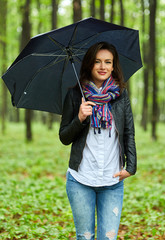 Woman with umbrella in the rain