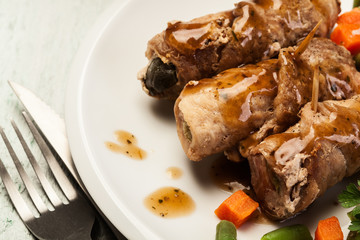 Pork rolls and vegetables