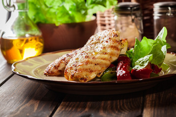 Grilled chicken breasts served with grilled paprika