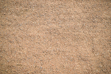 Background, texture of sand, warm shade on the whole frame. Horizontal frame
