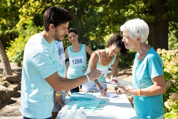 Athletes registering themselves for marathon
